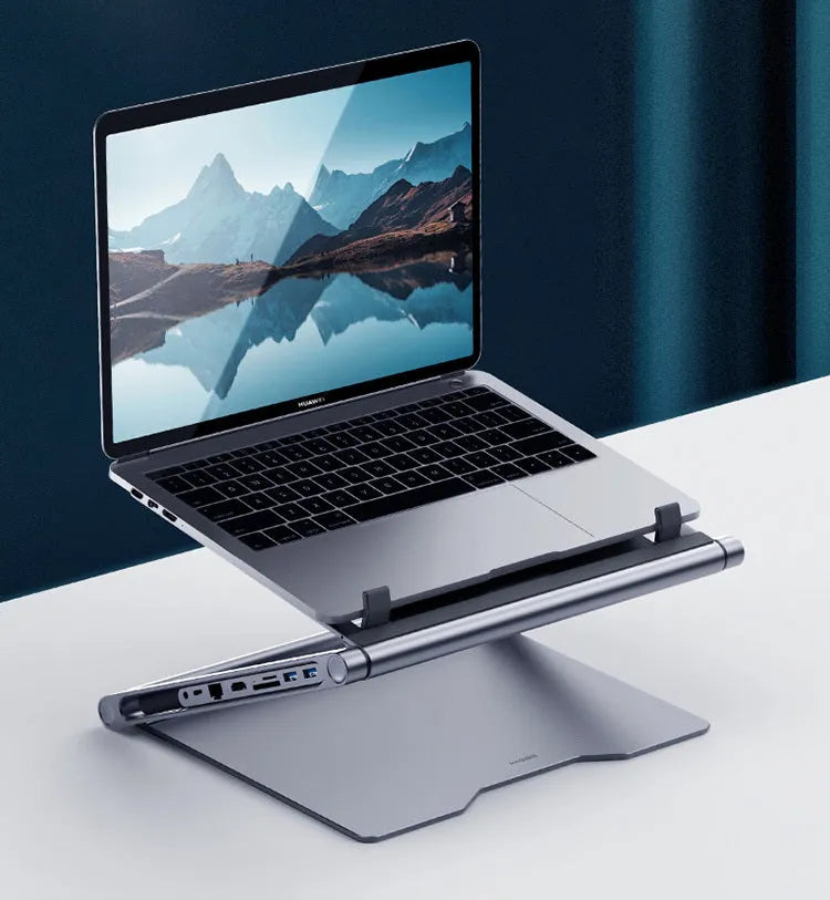 Aluminium laptop stand with 8-in-1 docking station in deep space grey on a desk