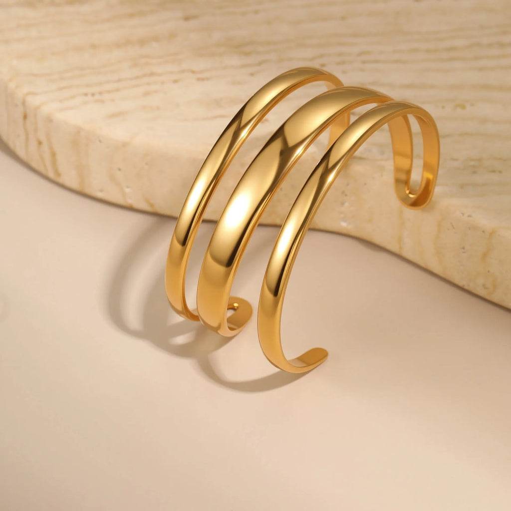Stainless steel geometric opening bracelet with 18K electroplating in gold or steel colour