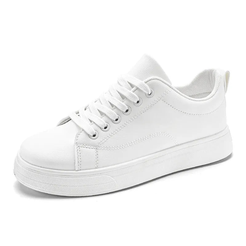 Men's white and black Korean-style low-top casual sneakers with round toe and flat heel.