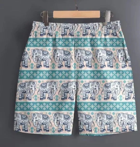 Men's casual polyester sports shorts in a camouflage print pattern, laid flat.