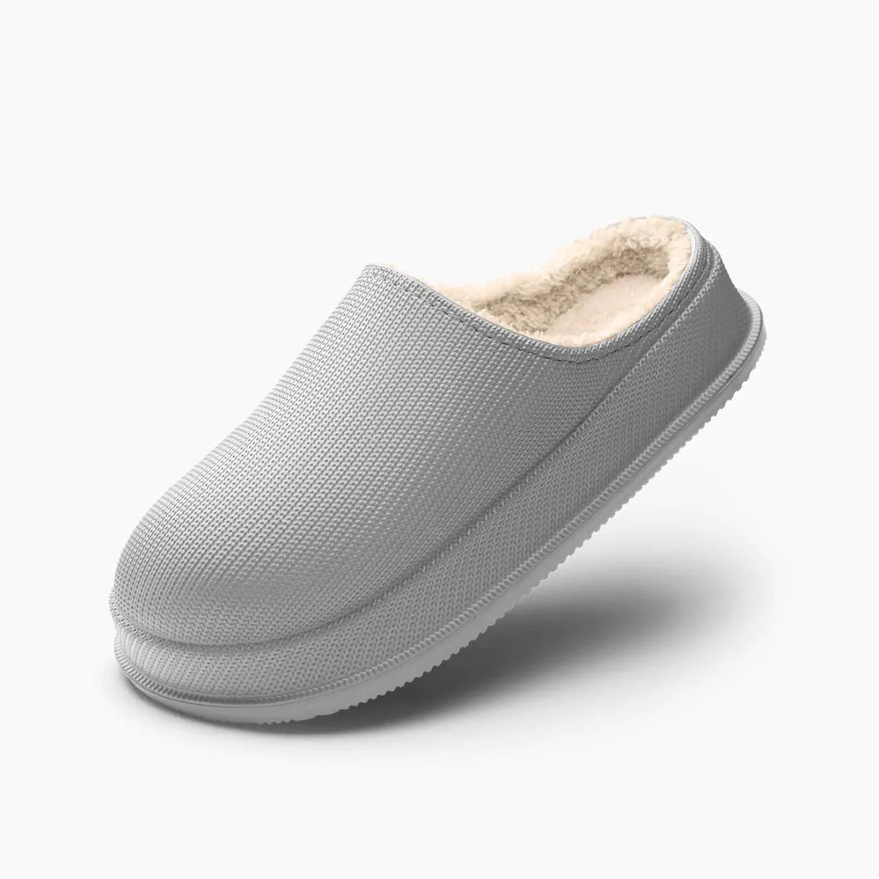 Unisex waterproof non-slip cotton slippers with EVA sole in multiple colours on a floor