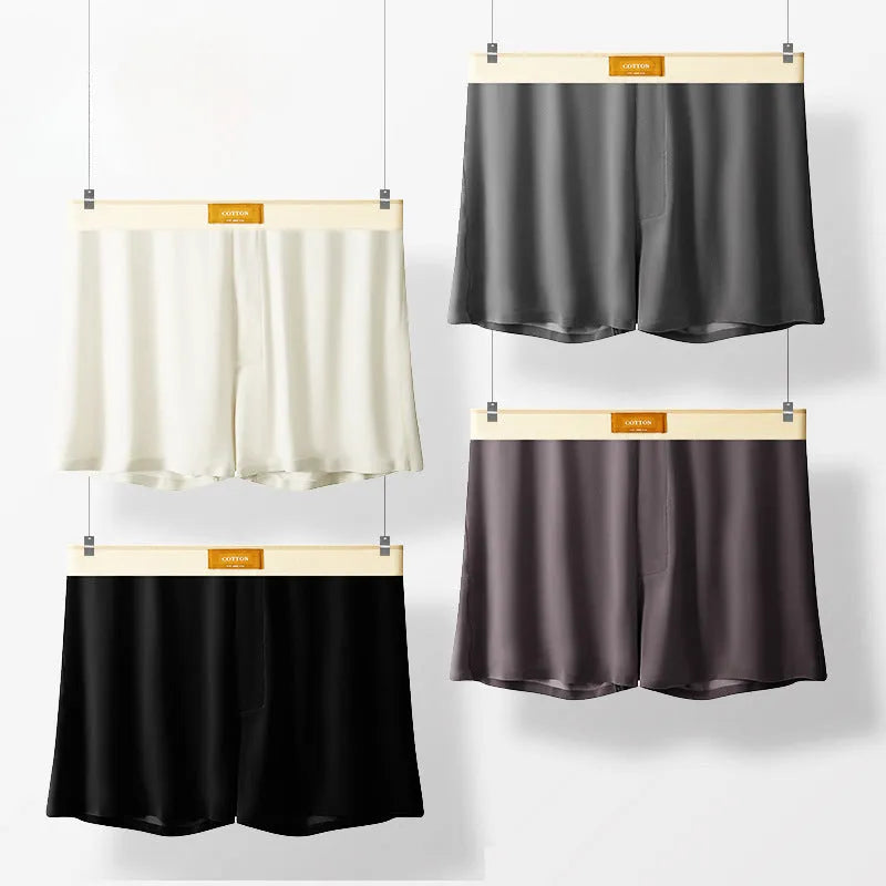 Men's ice silk boxer shorts in solid colours showing loose fit and mid waist design