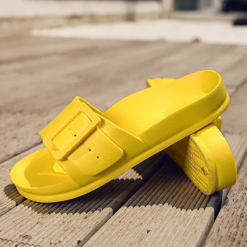 Women's grey blue flip-flop slippers with a single buckle and soft EVA sole.