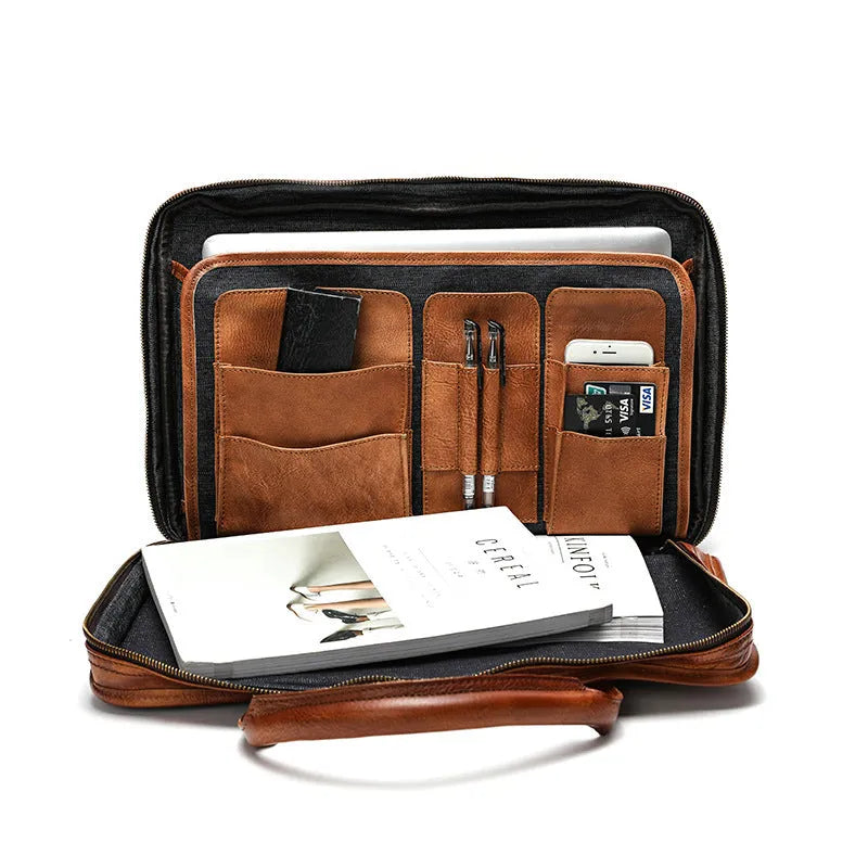 Men's vintage leather briefcase in black showing internal organisation pockets and 42cm width