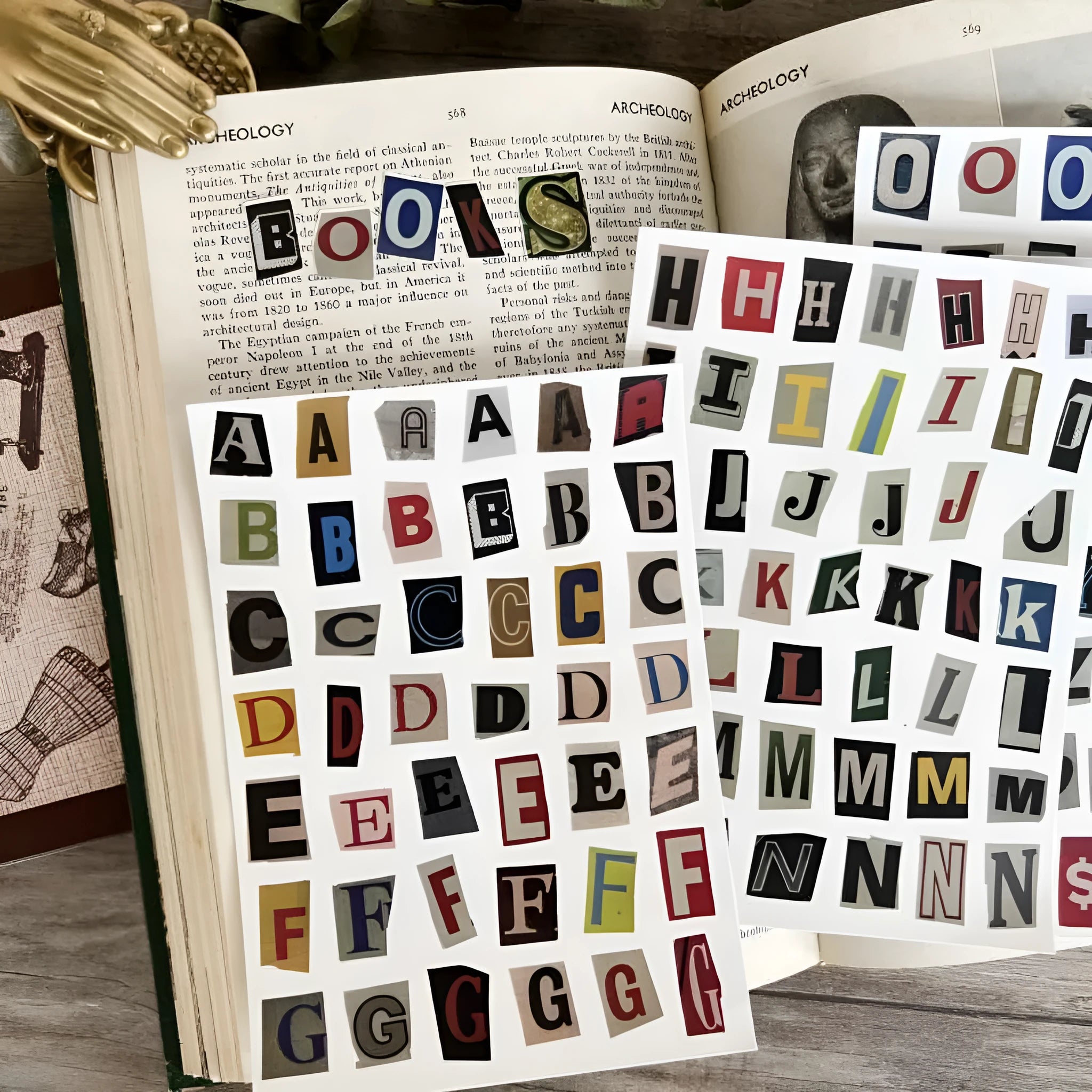 Decorative sticker sets showing English letters, numbers, and week words in colourful printed designs for crafting and labelling