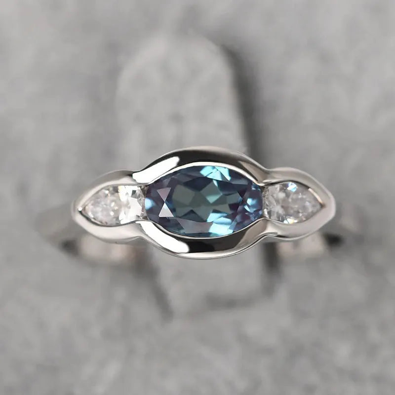 White gold geometric ellipse women's ring with zircon inlay on copper