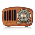 Retro wooden wireless mini speaker in cherry wood finish showing front and side.