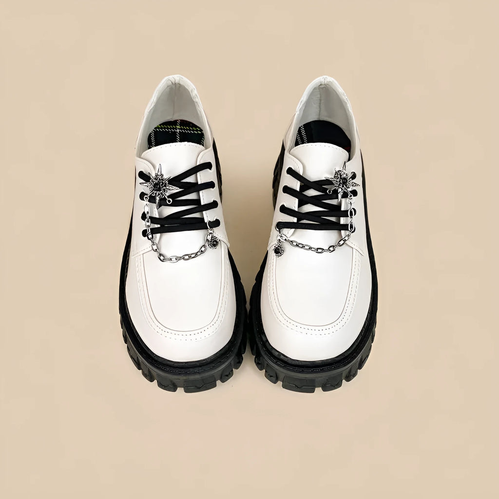 Women's preppy college loafers in Duke Asterism colour with cross shoulder straps and round toe design