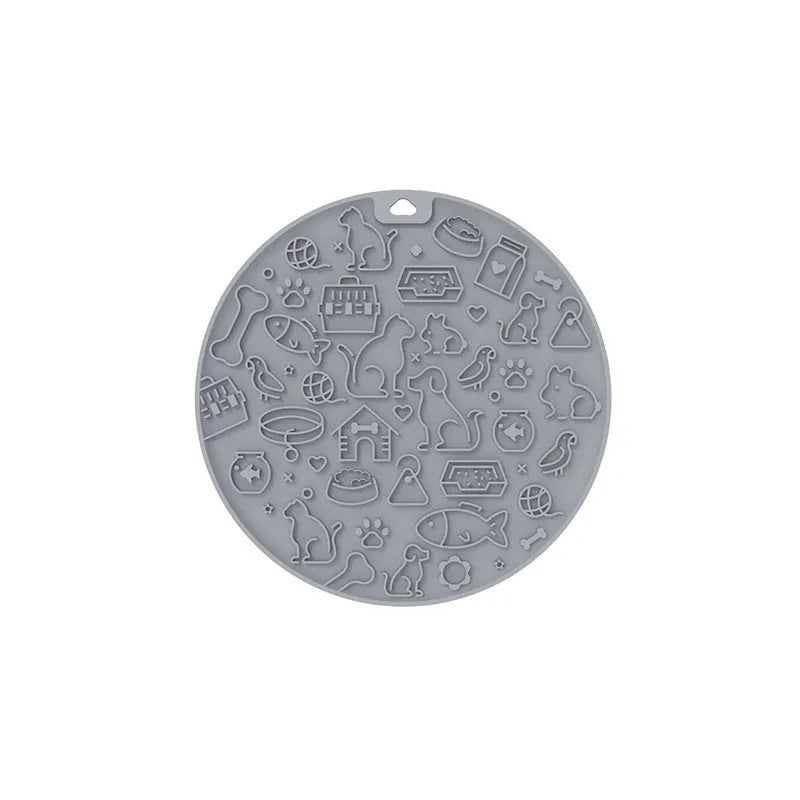 Round silicone pet licking mat with suction cup in blue, pink, grey, mint, or orange colour.