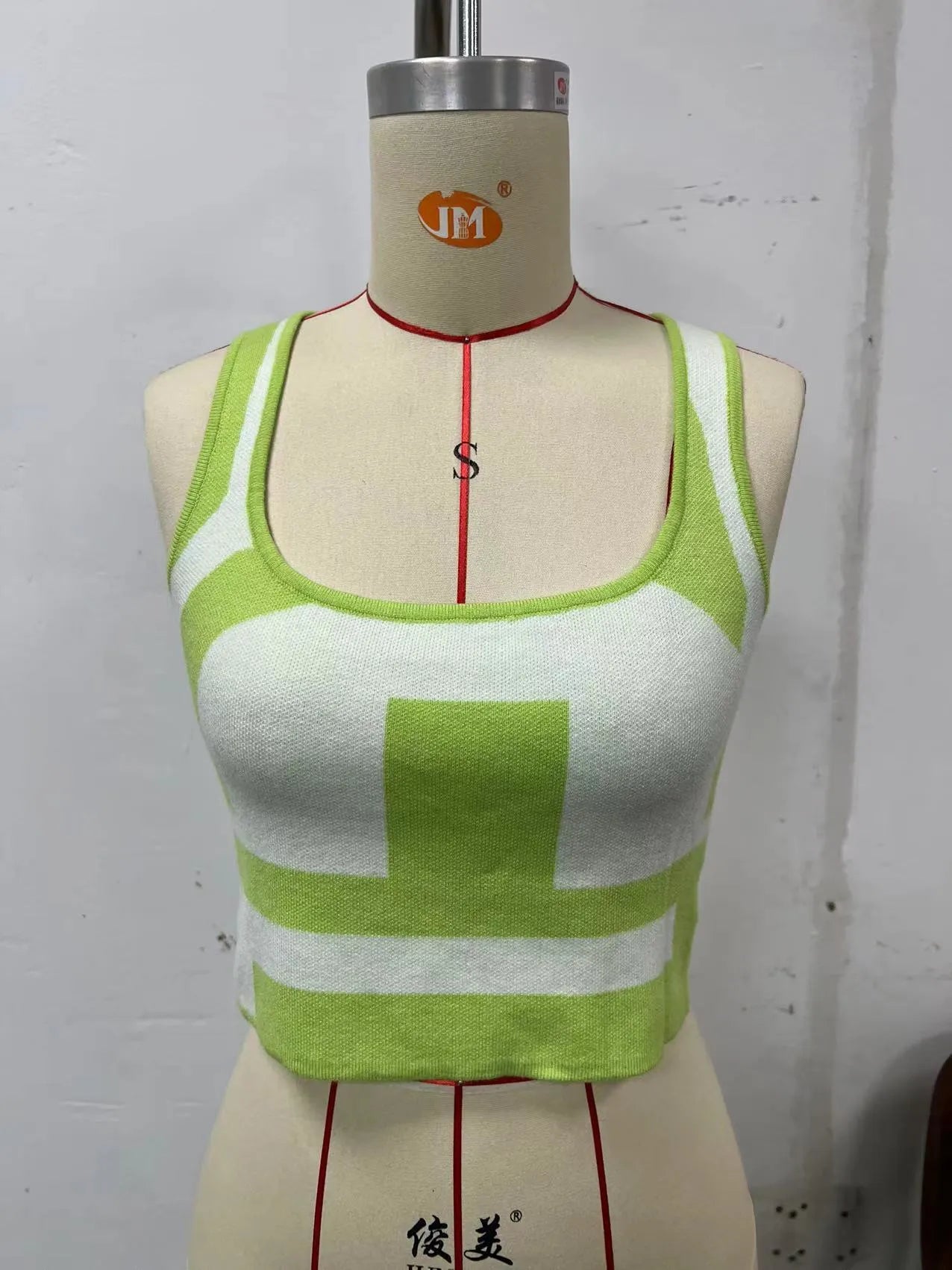 Women's U-neck contrast colour camisole with exposed navel styling in Core-spun polyester fabric