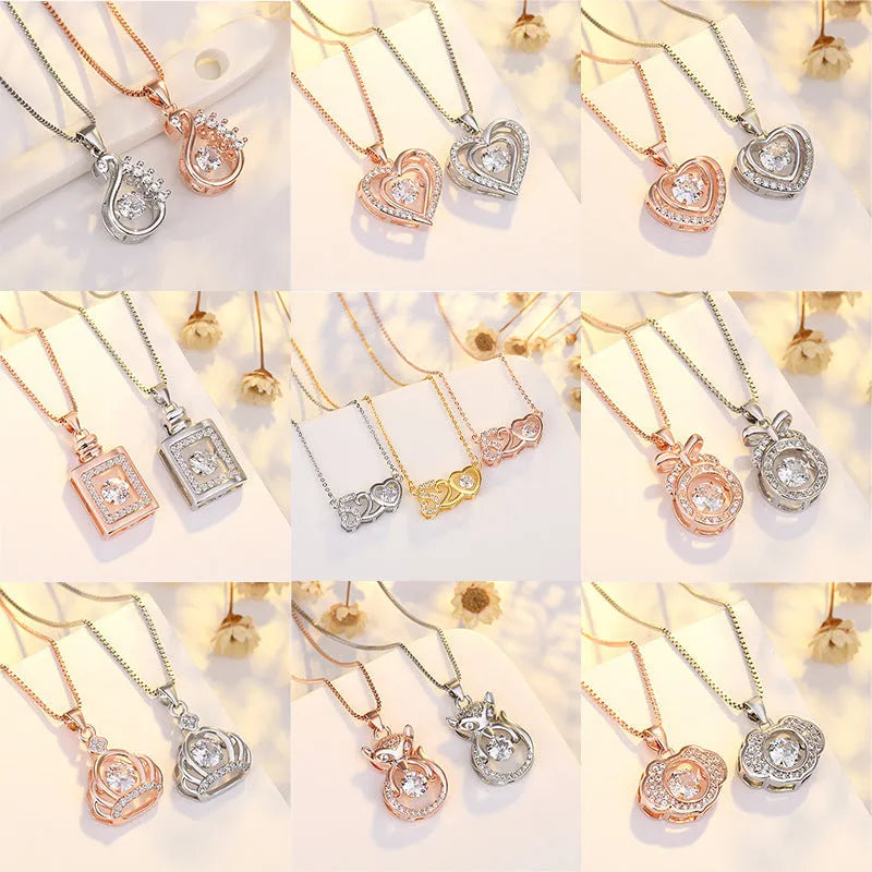 Sterling silver love heart pendant necklace with crown and bow detailing in rose gold or silver finish