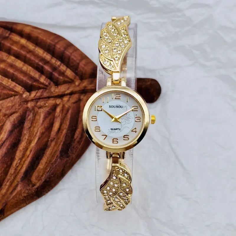 Women's stainless steel watch with round dial on a metal strap with Vachette clasp.