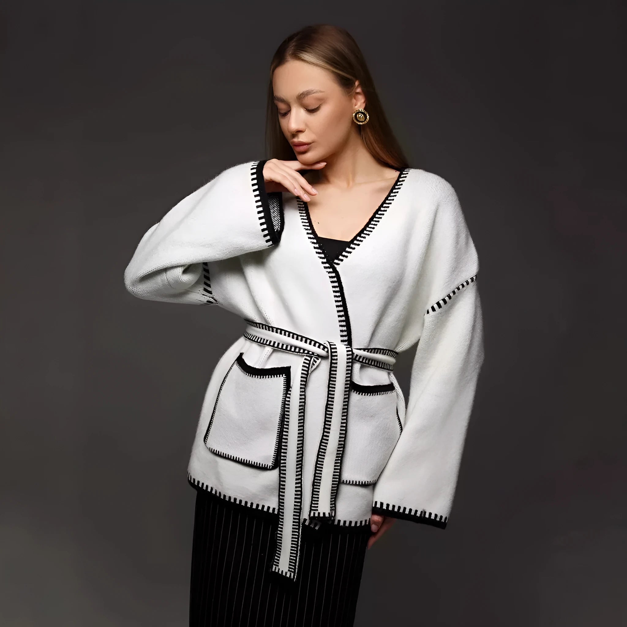 Lace-up knitted cardigan in camel colour with loose fit and mid-length design
