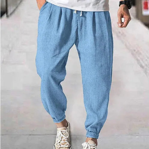 Men's loose-fit cotton trousers with elastic ankle cuffs in multiple colour options