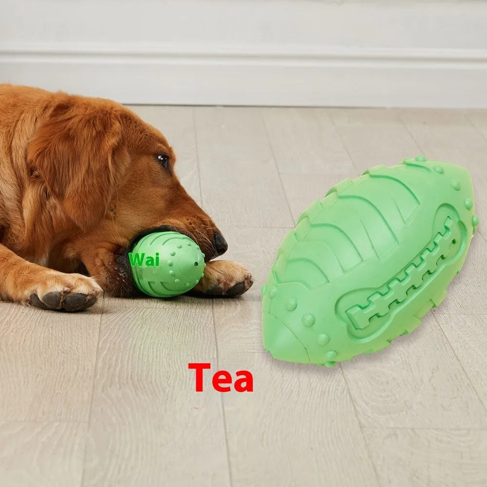 Light green bite-resistant rubber rugby ball dog toy for chewing and interactive training.