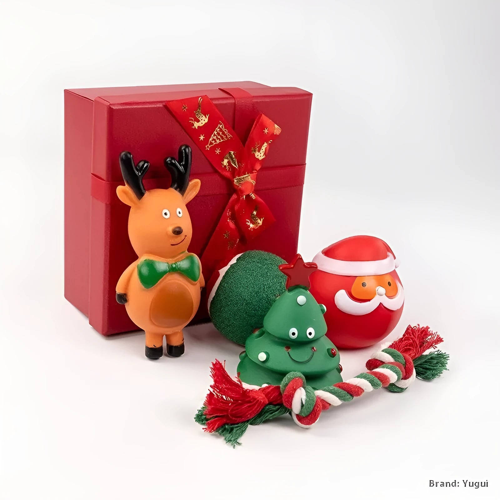 Christmas-themed vinyl dog chew toy set including barbells, balls, ropes, and festive figures in gift packaging.