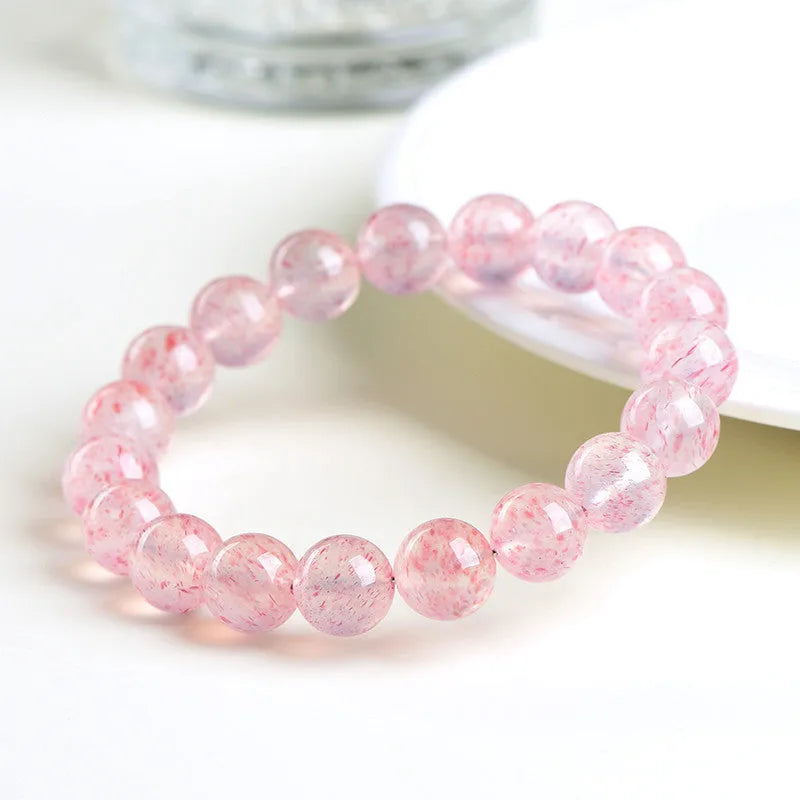 White strawberry quartz crystal bracelet with 10-10.8mm geometric beads