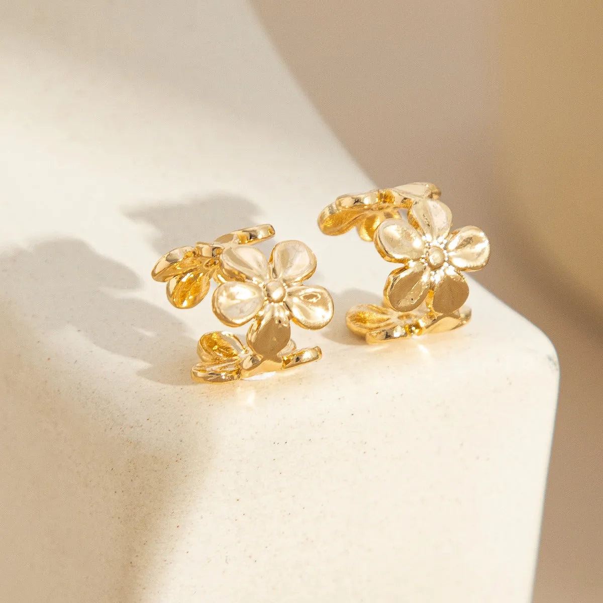 Gold electroplated starfish scallop ear drops for women with conch marine animal designs