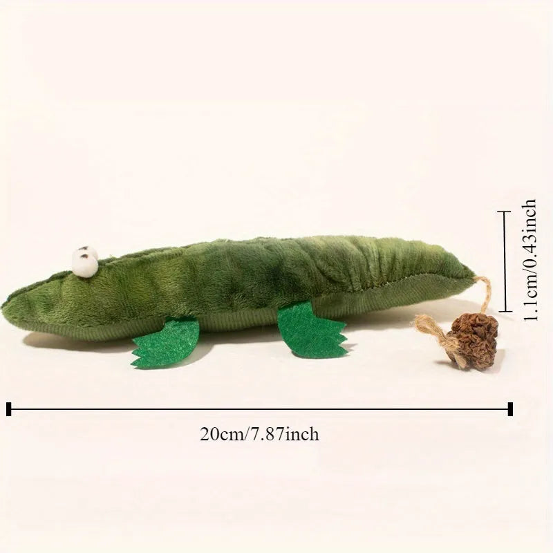 Green plush alligator catnip toy with plant-based materials and natural peppermint scent