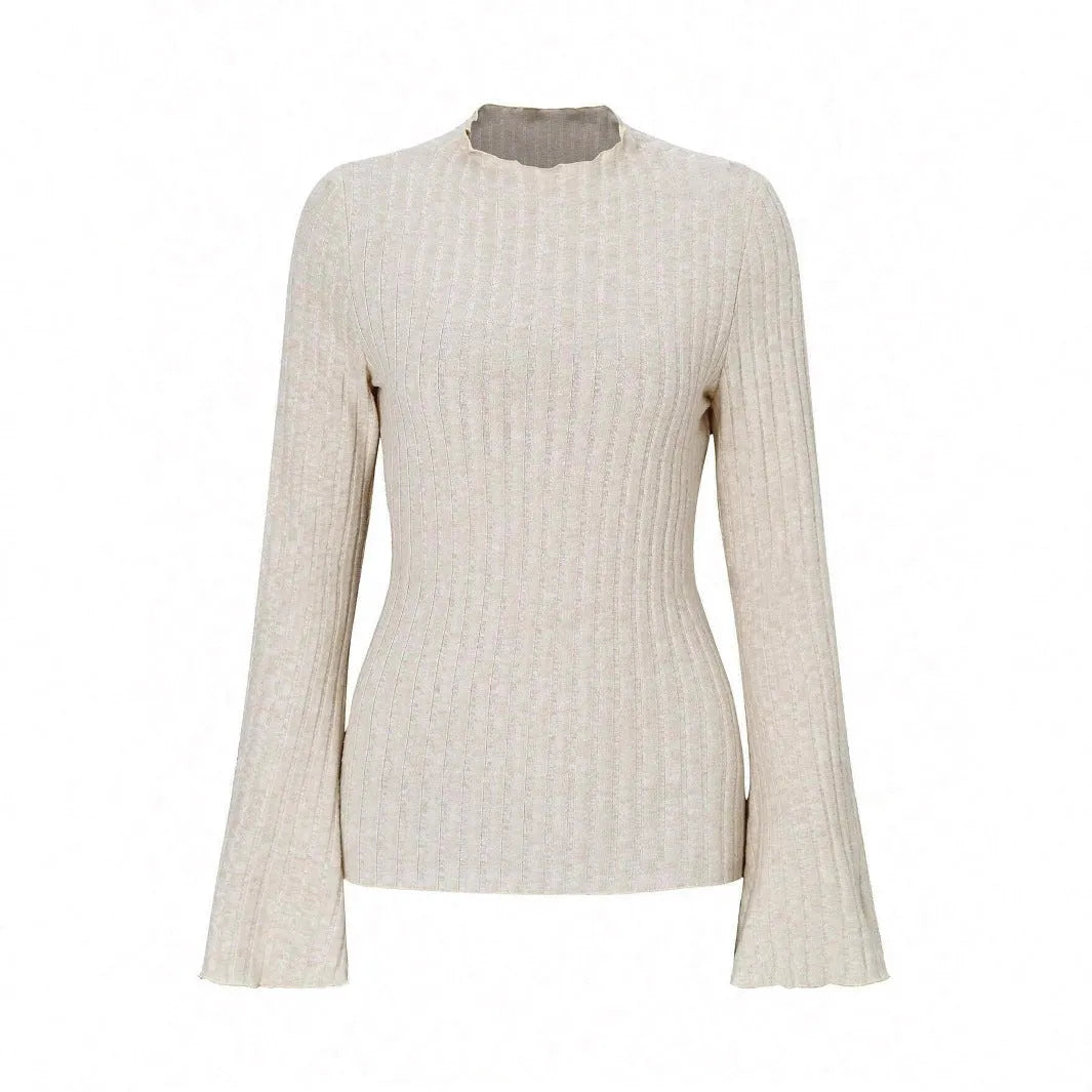 Black slim fit long sleeve top with round neck and lantern sleeves on a mannequin.