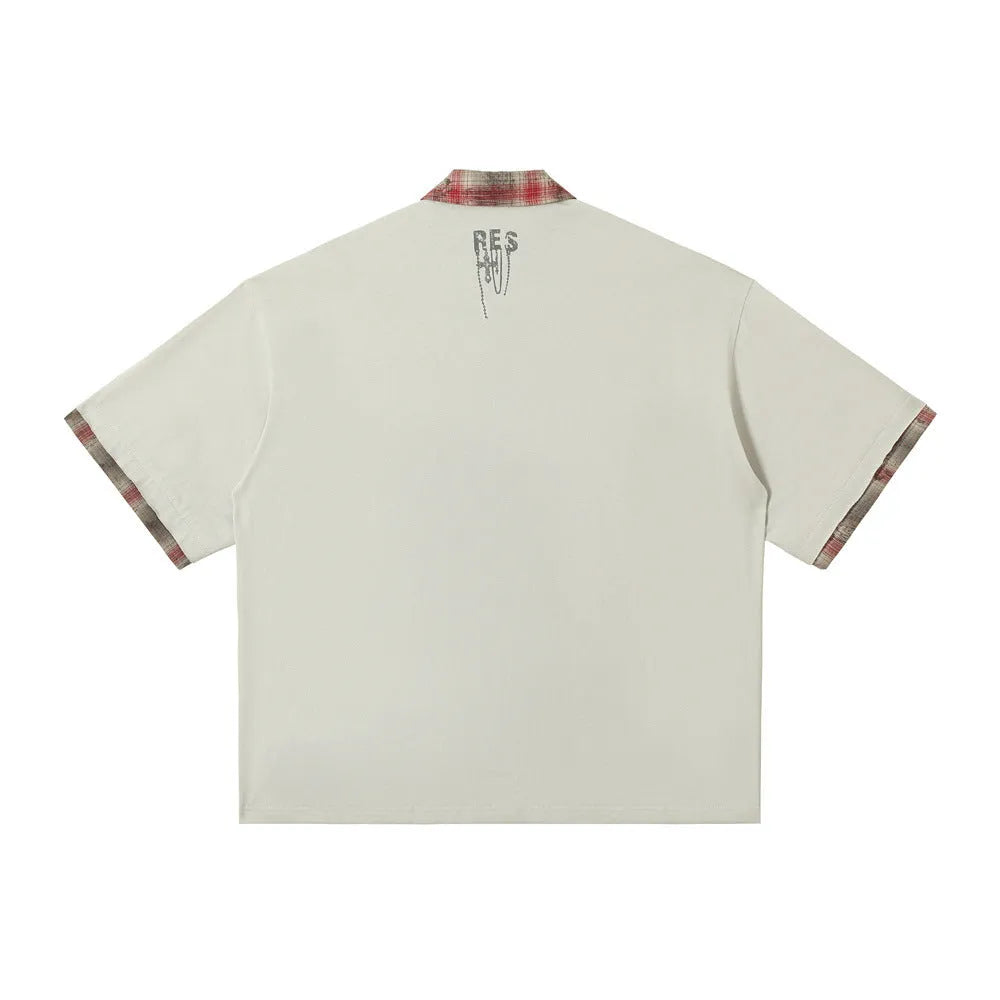 Men's loose blue cotton top with asymmetric design and graffiti print on the lapel.