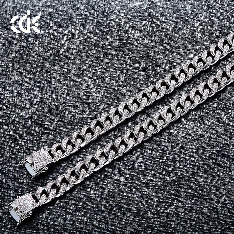 Gold men's Cuban chain bracelet with geometric zircon detailing on alloy frame
