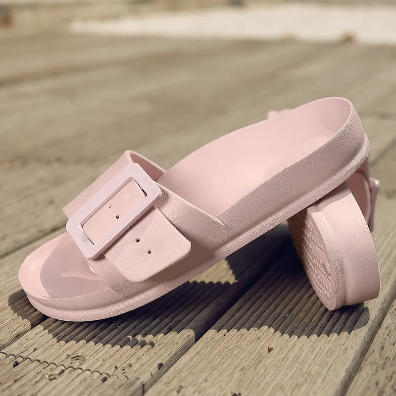 Women's grey blue flip-flop slippers with a single buckle and soft EVA sole.