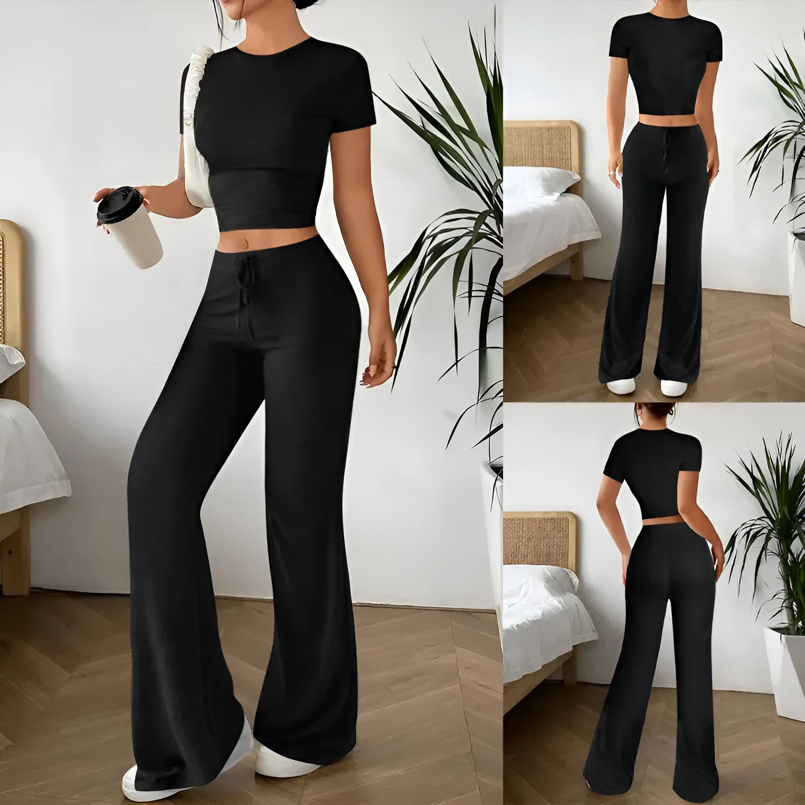 Women's black high waist trousers and short sleeve T-shirt suit set on a hanger