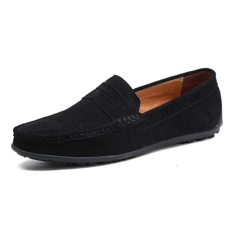 Men's brown suede casual loafers with a round toe and flat rubber sole on a white background.