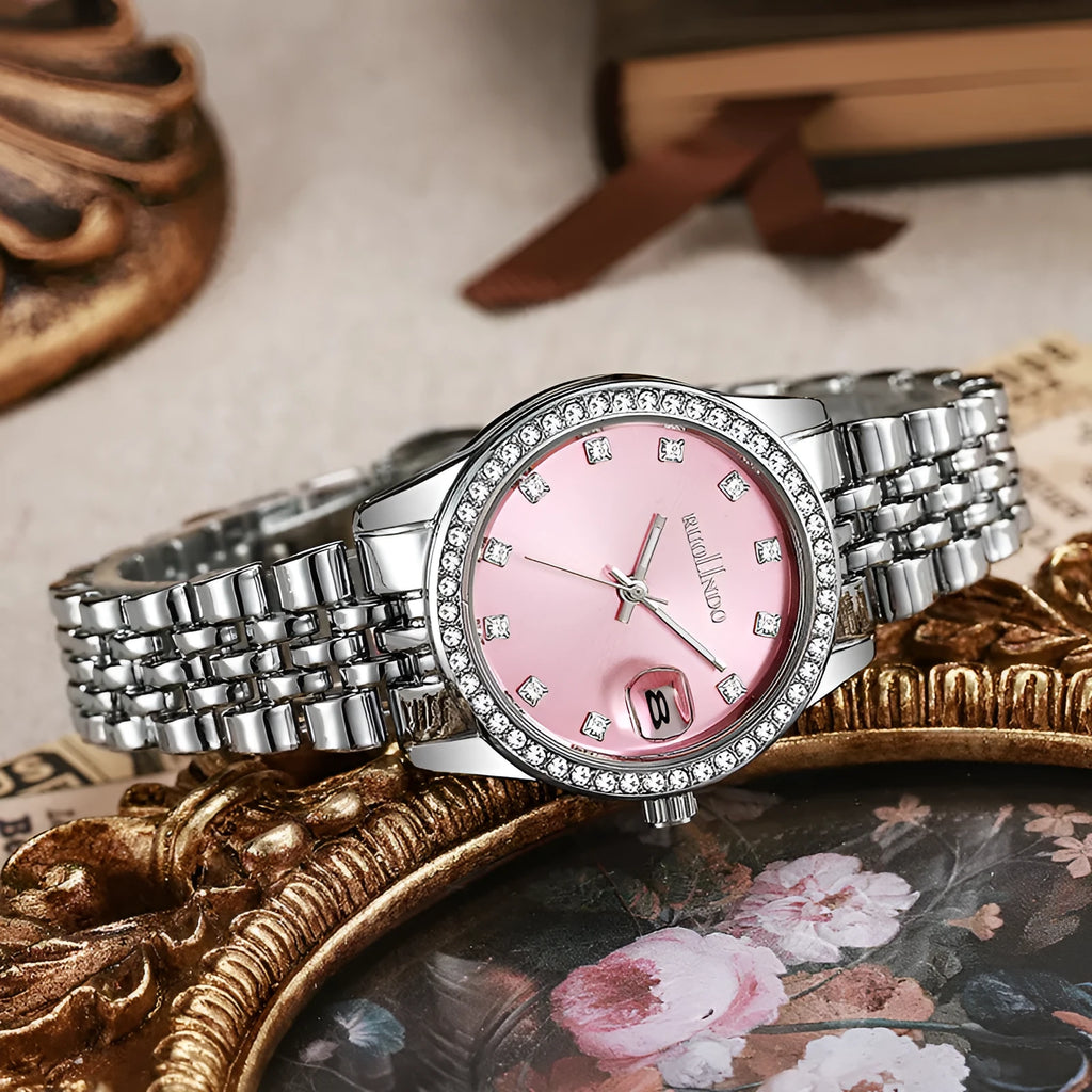 Women's silver alloy fashion watch with circular dial and stainless steel buckle on wrist.