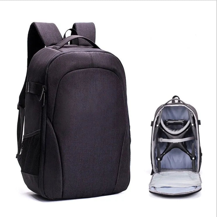 Black Oxford cloth drone backpack showing internal camera, laptop, and organiser pockets.
