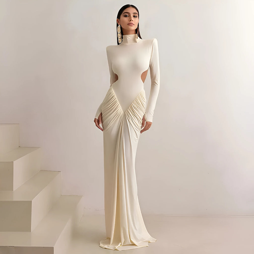 Women's slim fit high collar long sleeve dress with pleated backless detail in light apricot colour.