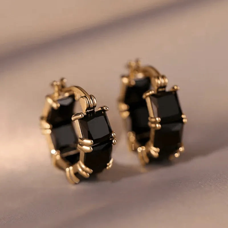 Geometric U-shaped gold-plated copper earrings with round elements and zircon accents in black, pink or white