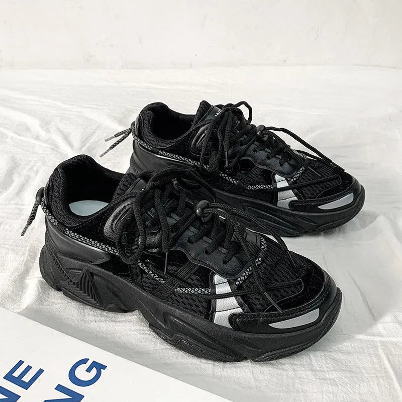 A pair of men's white Korean-style platform sports shoes with a lace-up front.