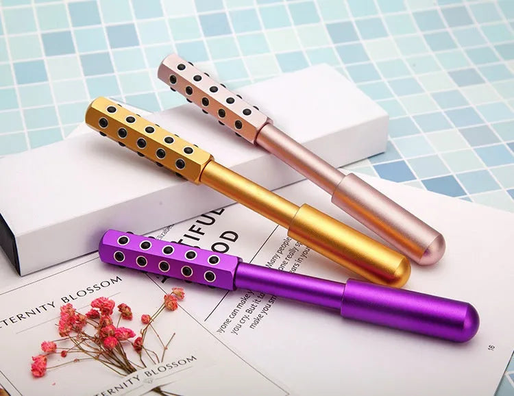 Purple Germanium particle facial massage roller with 24 grains for eye and facial beauty treatment