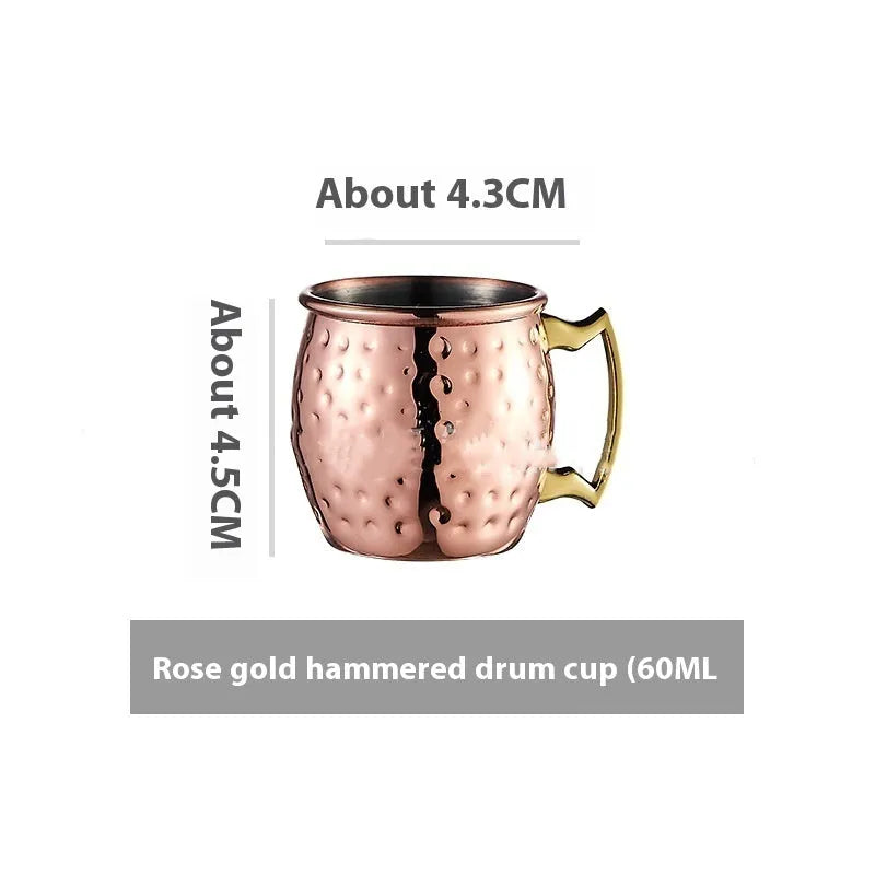 Stainless steel Moscow Mule cup with copper plating in hammer point style showing metallic finish.