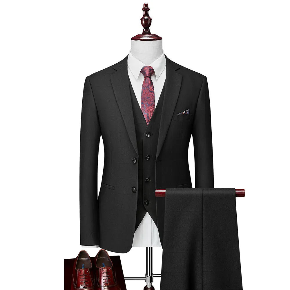Men's navy blue slim fit three-piece plaid suit with jacket, vest, and trousers on a hanger.