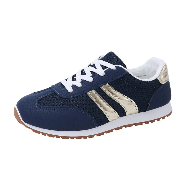 Blue women's casual tennis shoes with cross shoulder straps and rubber soles