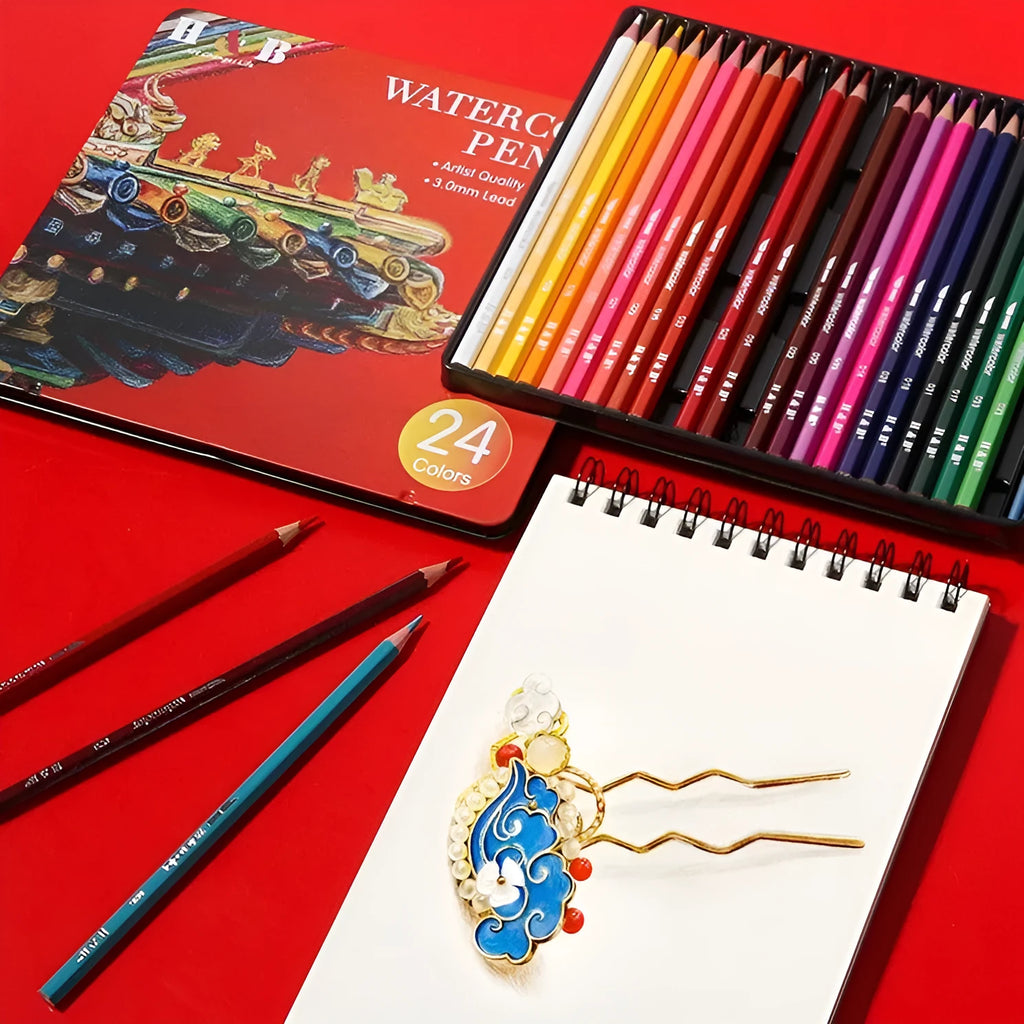 Open iron box showing 24 water-soluble coloured pencils in assorted colours.