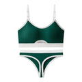 White sports underwear vest with contrast back detail and matching underwear, shown on a hanger.