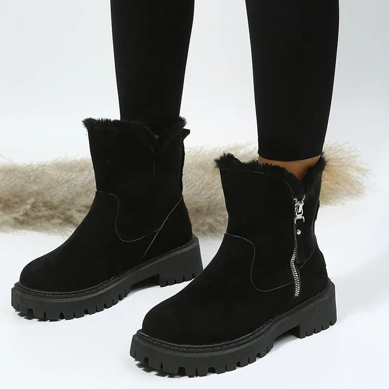 Black women's high-top snow boots with side zipper, faux suede upper, and non-slip rubber sole.