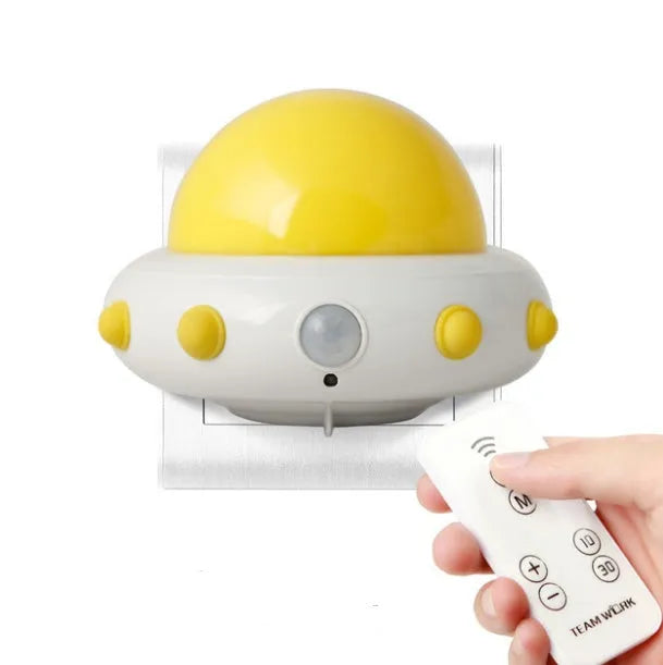 Remote control UFO shaped bedside night light in blue, pink or white colours