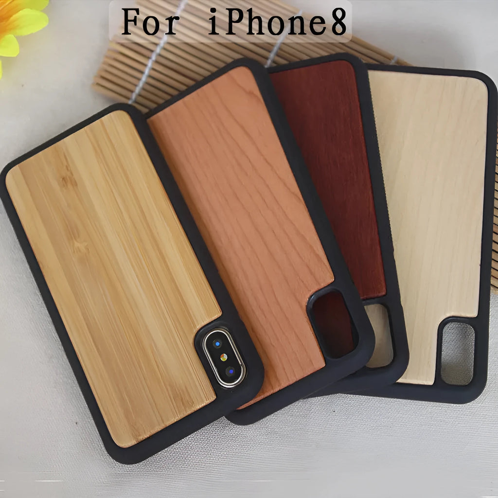 Wooden carbonised bamboo and black TPU bumper case for iPhone on a wooden table.