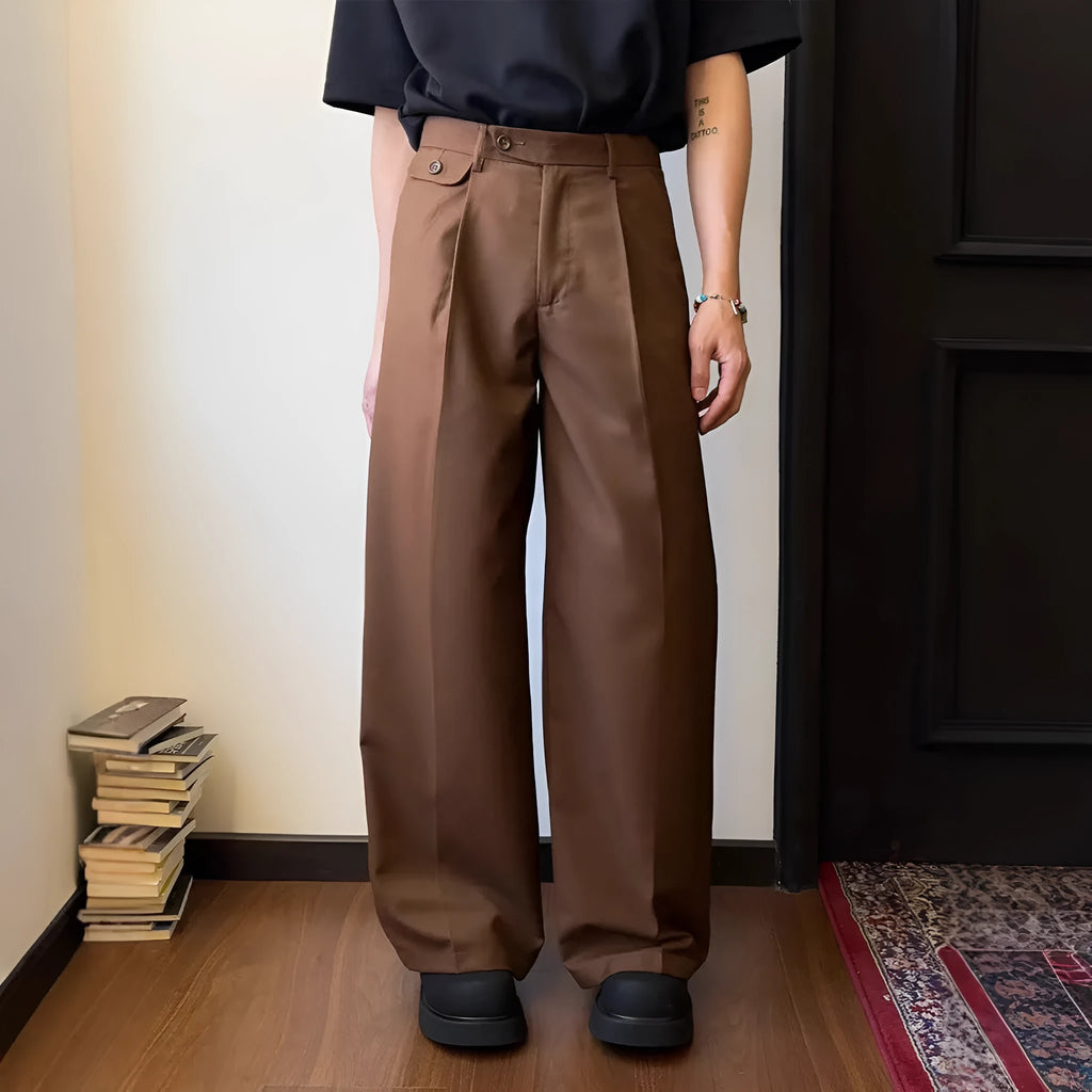 Men's brown straight-leg casual trousers with wide-leg drape fit on hanger