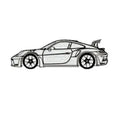 Black iron metal sports car wall art decoration against a wall