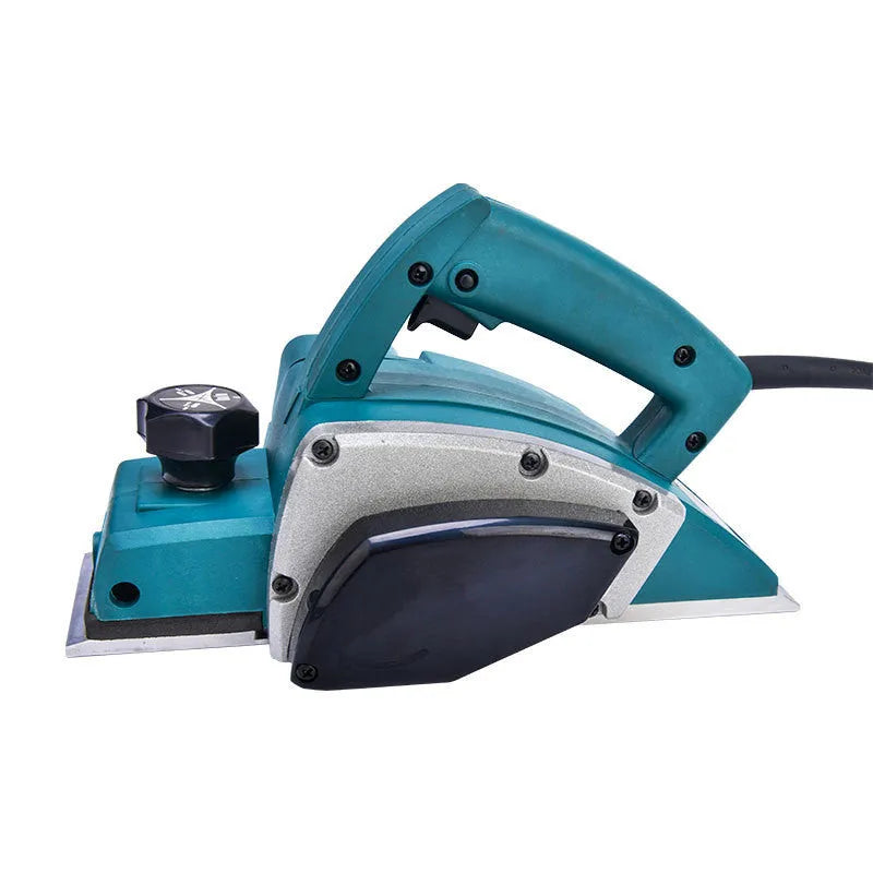 Red aluminium shell electric wood planer tool with 82mm planing width on a workbench.