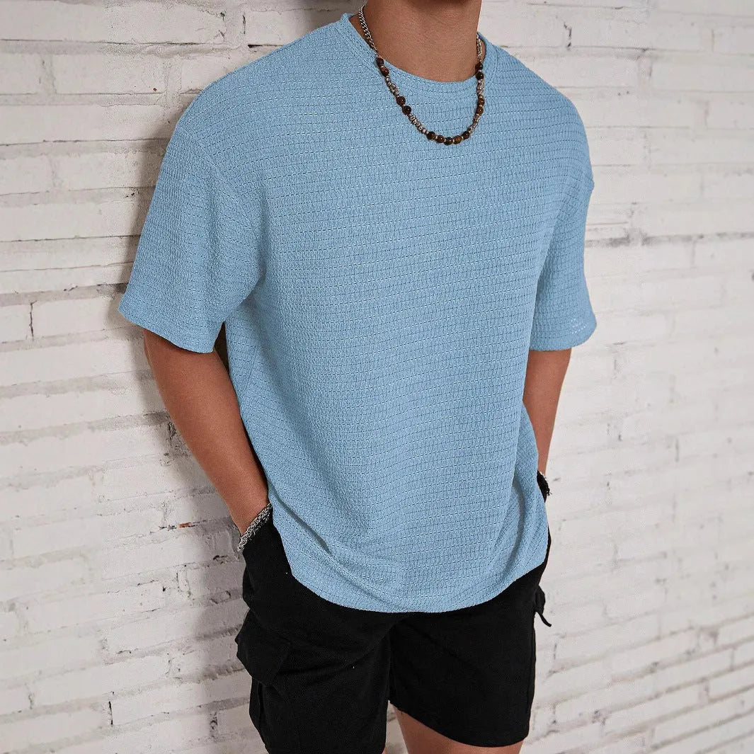 Men's slim fit polyester t-shirt in solid colours with round neck and short sleeves