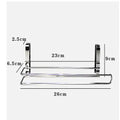 Silver stainless steel kitchen towel rack mounted on a white cabinet door.