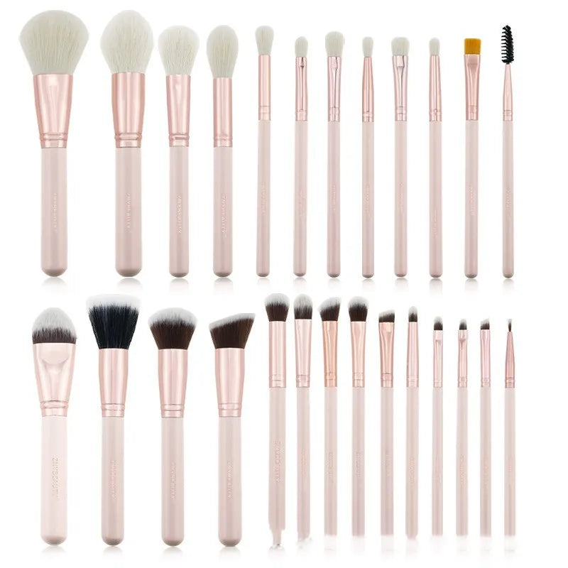 26 pink wooden handle makeup brushes arranged in a pink PU zip case.