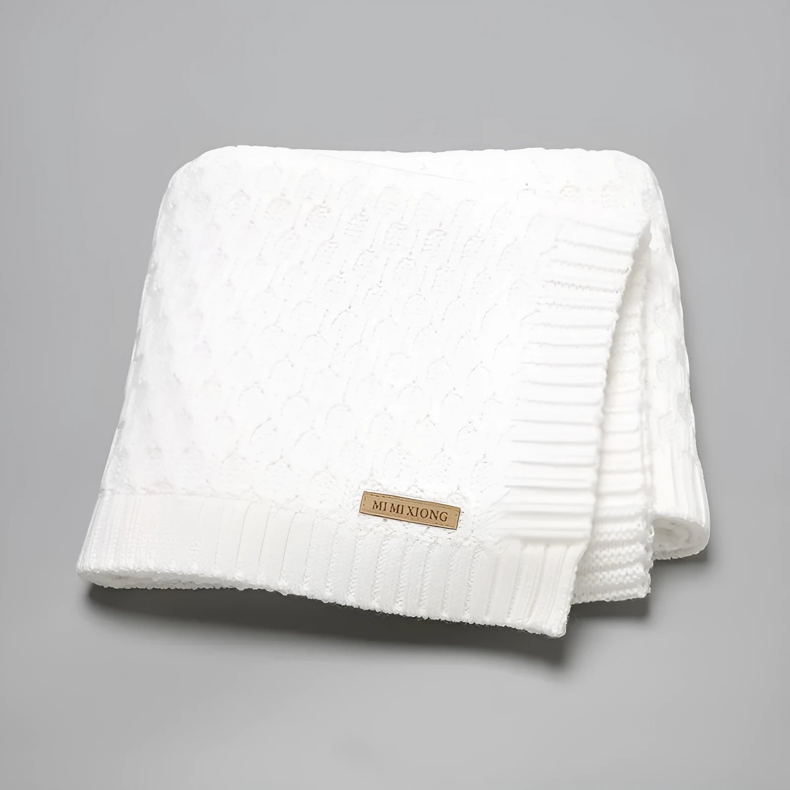 70×90cm solid colour infant blanket with three-dimensional lines texture in acrylic fabric